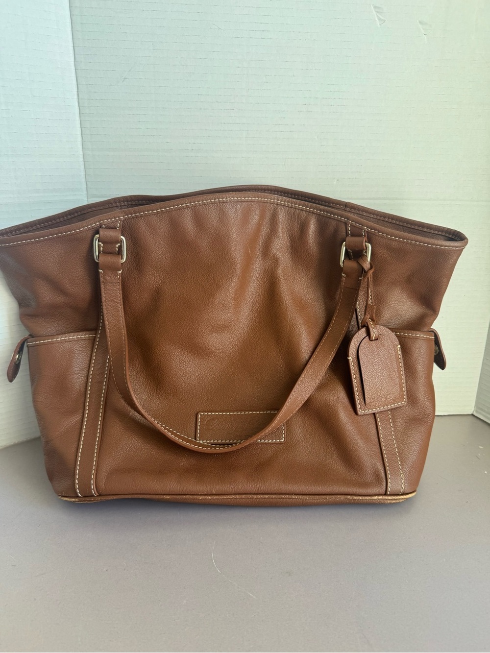Dooney & Bourke Brown Leather Tote with Luggage Tag